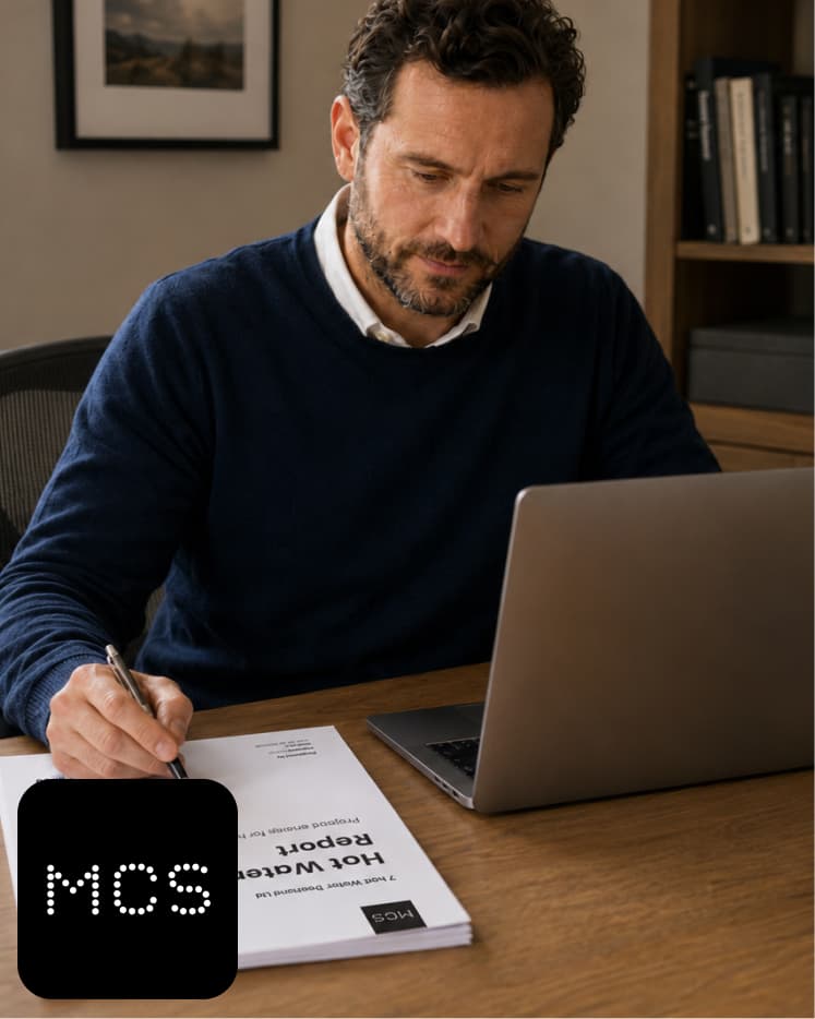 Engineer reviewing MCS compliance documents
